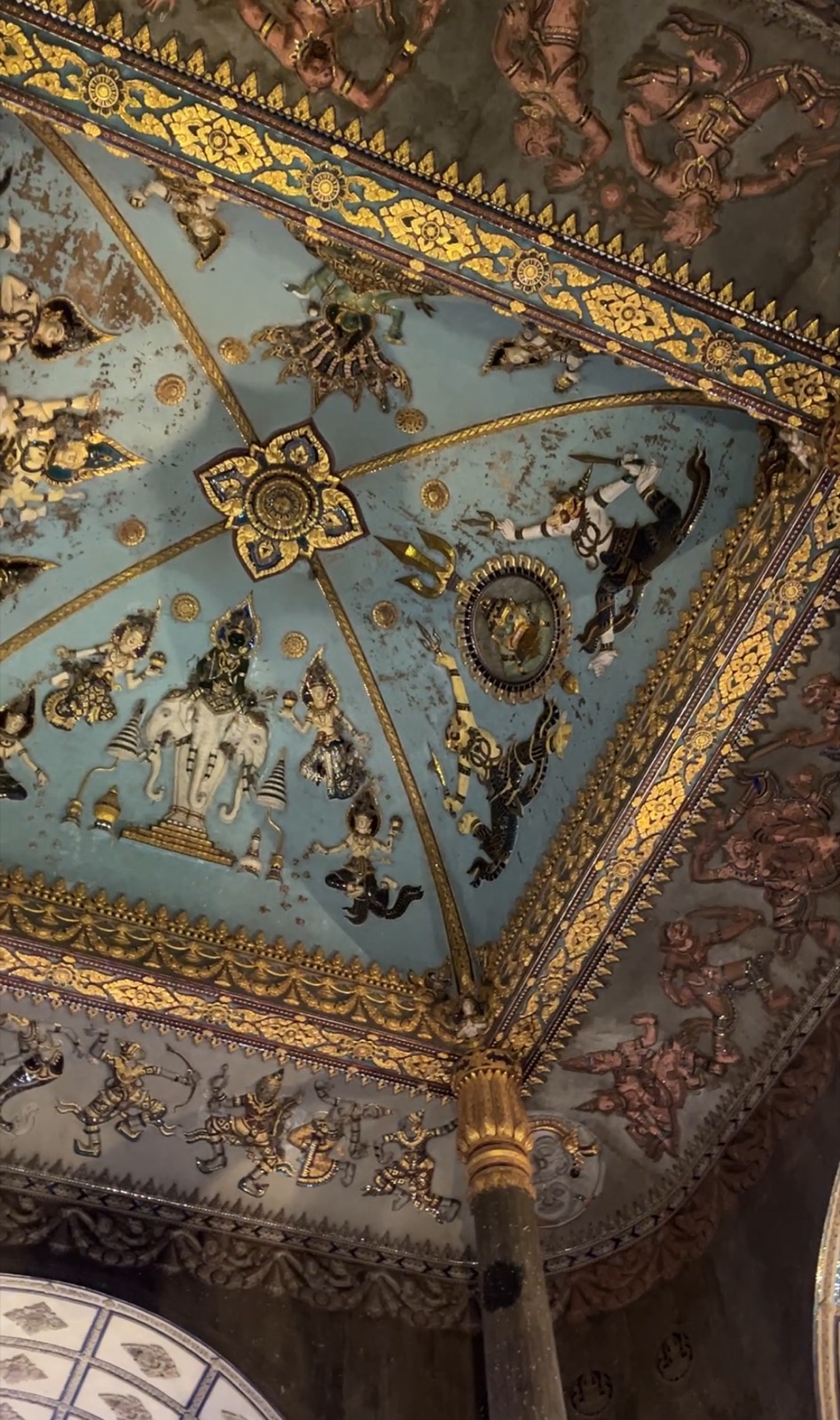 An ornate ceiling photographed while travelling