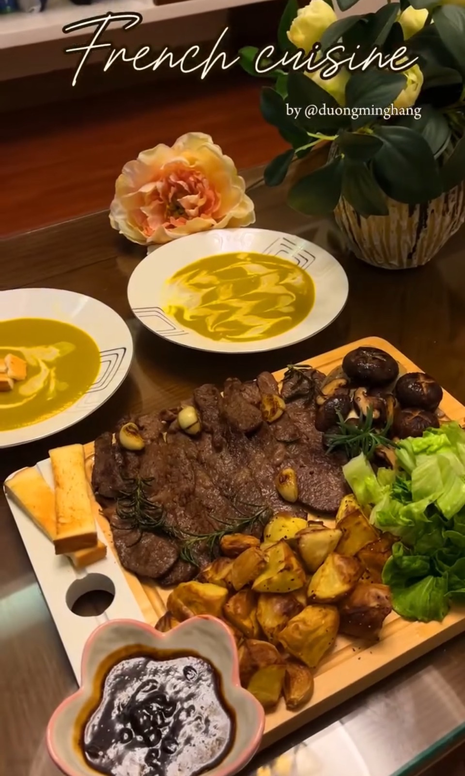 A home-cooked meal with steak, potatoes, mushrooms and soup