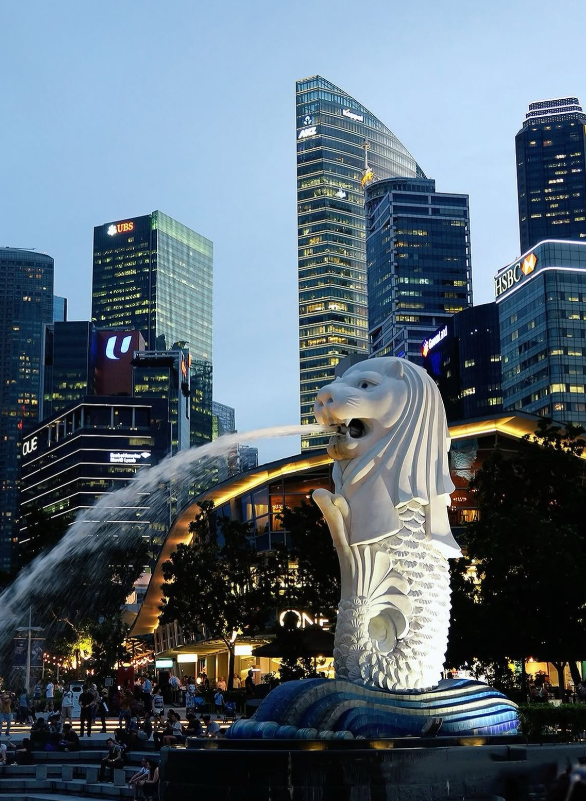 The Merlion and Singapore skyline at blue hour